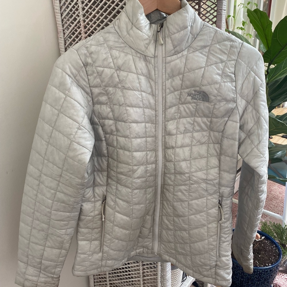 Packable, White north face nanopuff, good condition, discolored at wrist